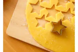Cookie dough with star-shaped cookie cutter